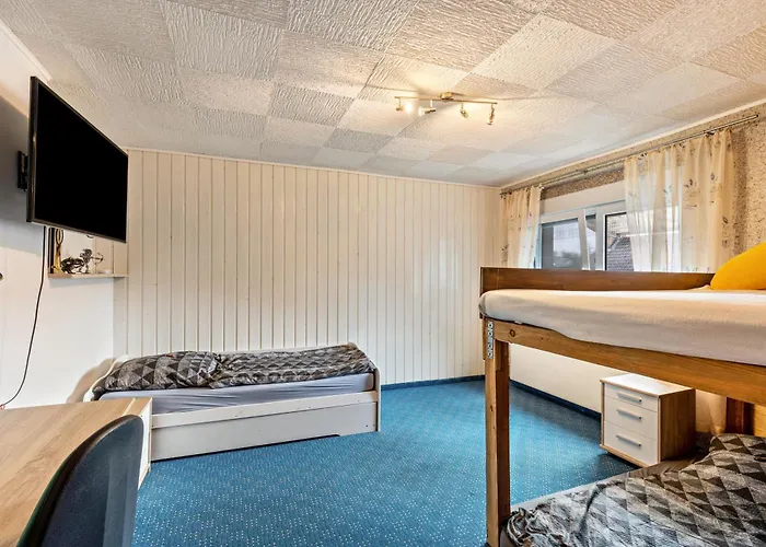 Familienhaus Lägenhet *